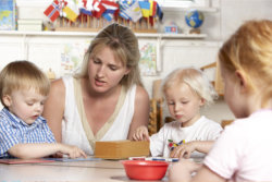 Teachers teaching the children how to paint