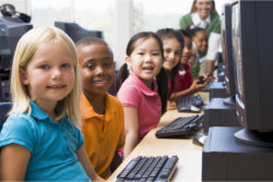 children sitting infront of their computer